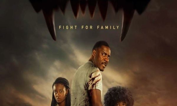 (L to R) Iyana Halley, Idris Elba, and Leah Jeffries play a family who find themselves hunted by a massive rogue lion in Beast.