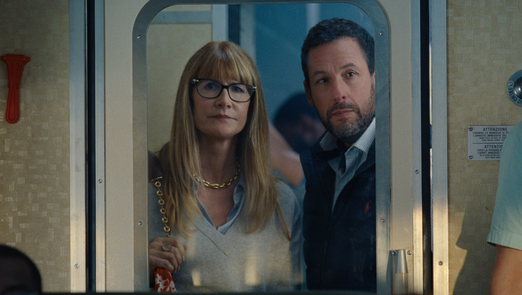 Laura Dern "Liz" and Adam Sandler "Ron Sukenick" in JAY KELLY